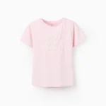 Camiseta rosa con relieve "Nazaré Amor Saudade" - Zippy